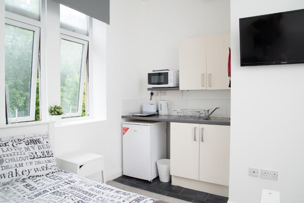Η κουζίνα ή μικρή κουζίνα στο TLK Apartments & Hotel - Beckenham Junction