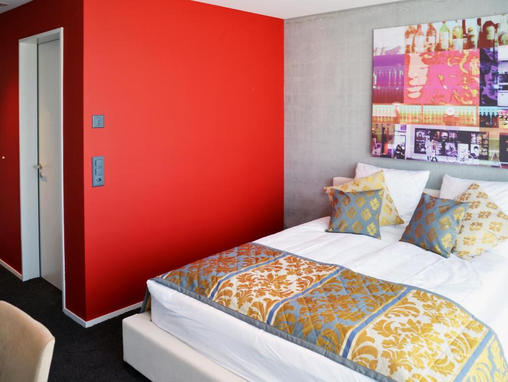 Postel nebo postele na pokoji v ubytování Hotel Swiss Star