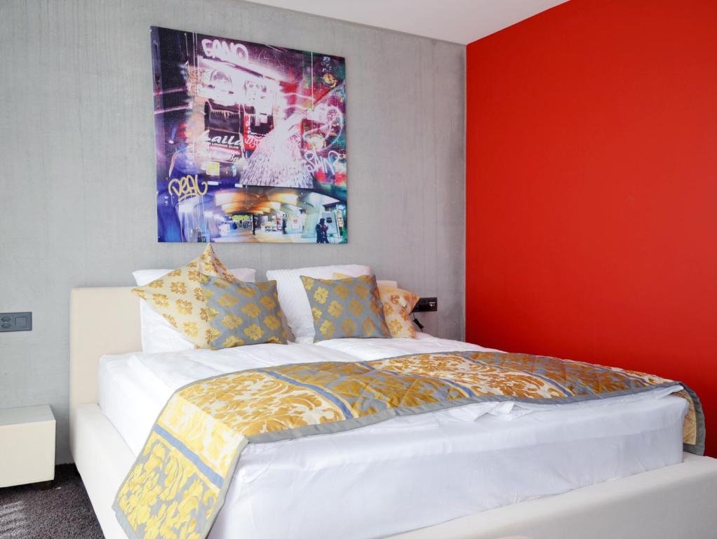Postel nebo postele na pokoji v ubytování Hotel Swiss Star