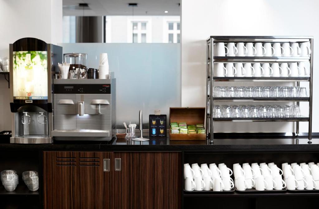 a kitchen with a counter with a coffee maker at Wakeup - Aarhus in Aarhus