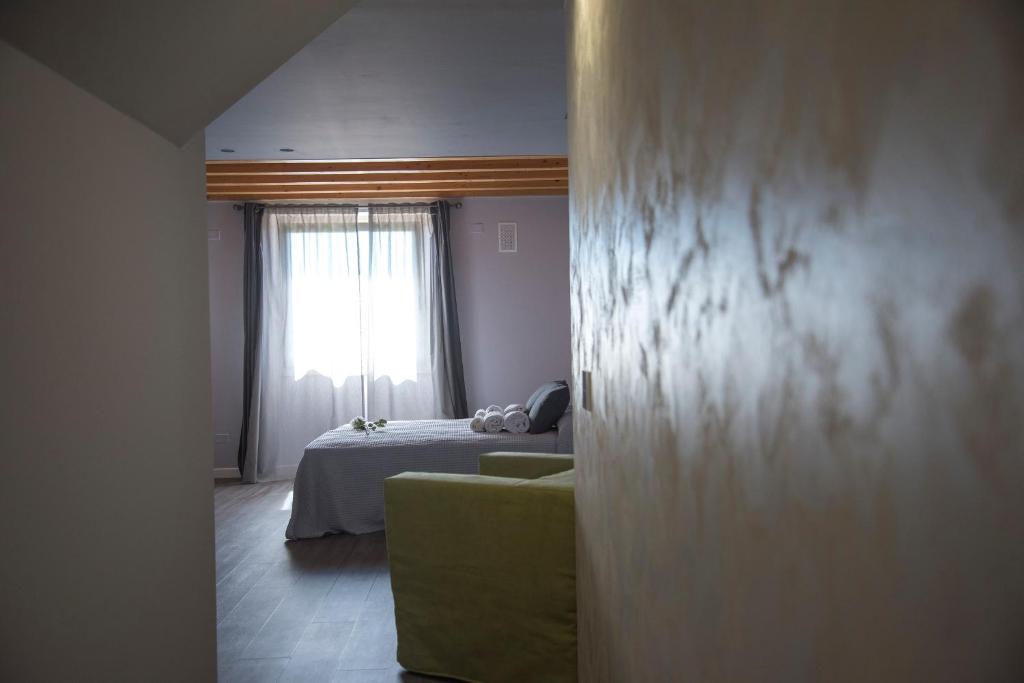 Postel nebo postele na pokoji v ubytování Michela BB & Relais