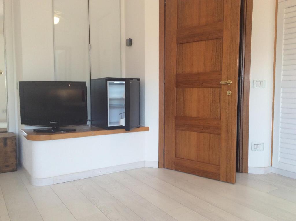 Telewizja i/lub zestaw kina domowego w obiekcie Casa di Anna