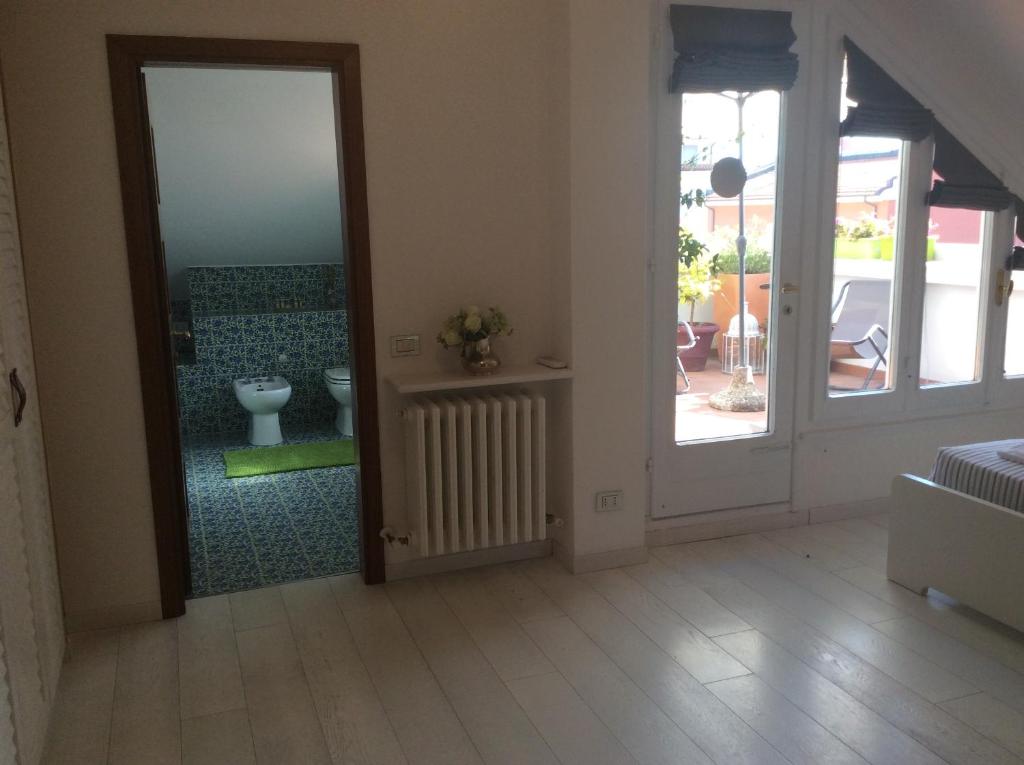 Łóżko lub łóżka w pokoju w obiekcie Casa di Anna