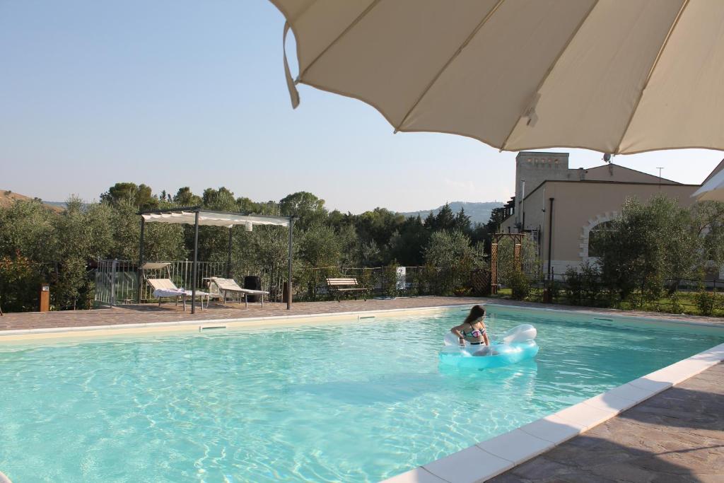 Bazén v ubytování Agriturismo L'Assiolo nebo v jeho okolí