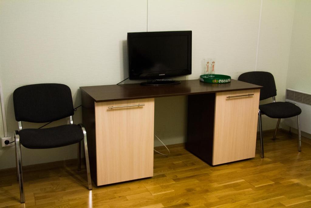 TV a/nebo společenská místnost v ubytování Hotel Obolon-Arena