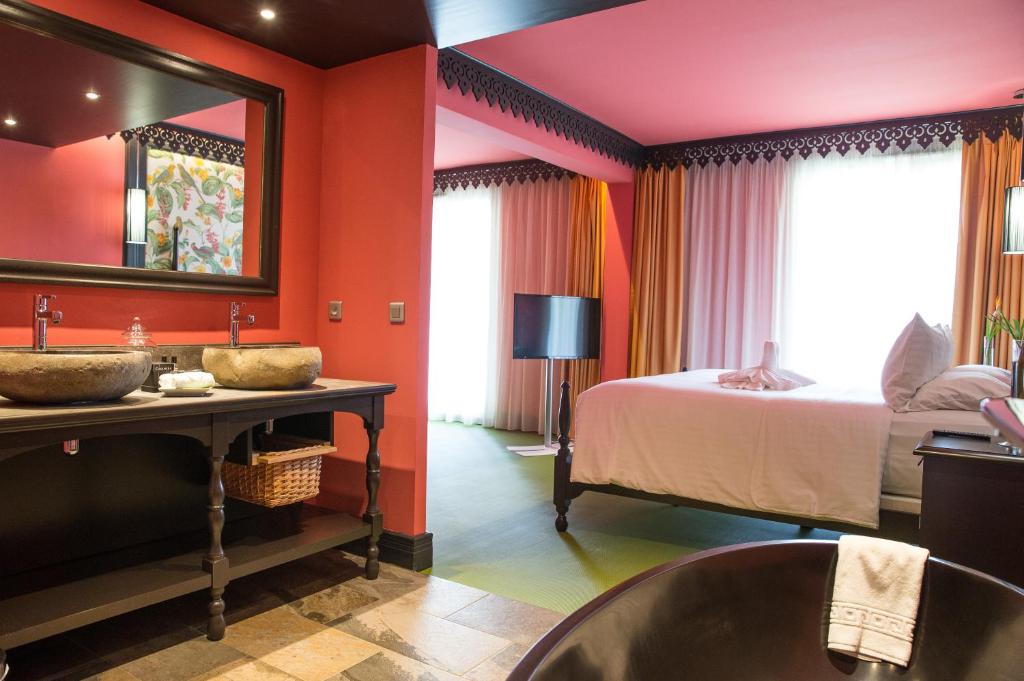 Postel nebo postele na pokoji v ubytování Villa Delisle Hôtel & Spa