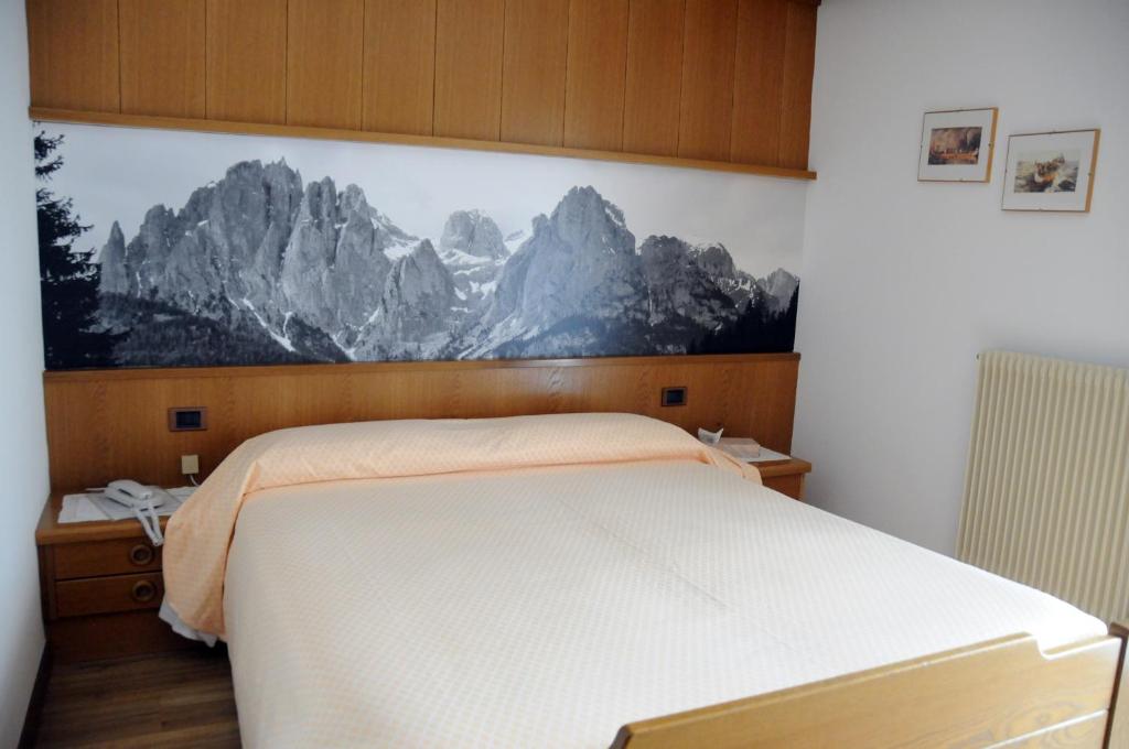 Postel nebo postele na pokoji v ubytování Hotel Garni Soreie
