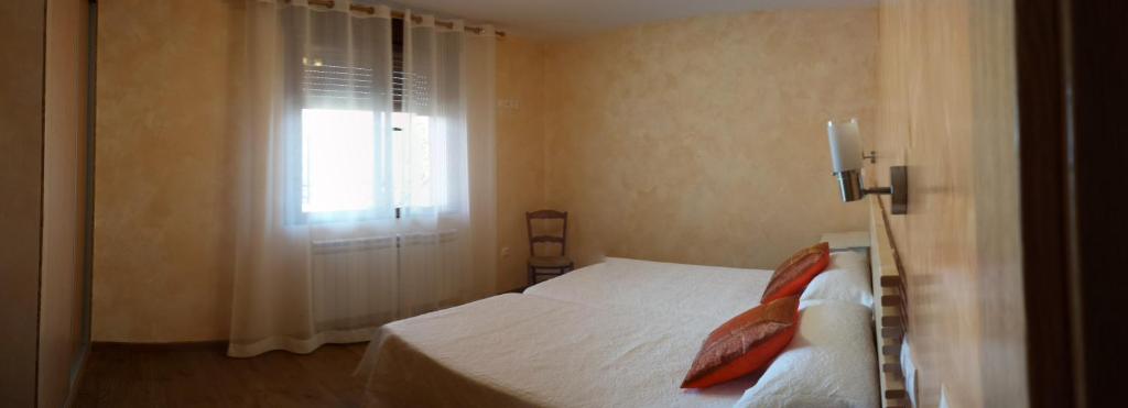 Postel nebo postele na pokoji v ubytování Tradicion Rural SL