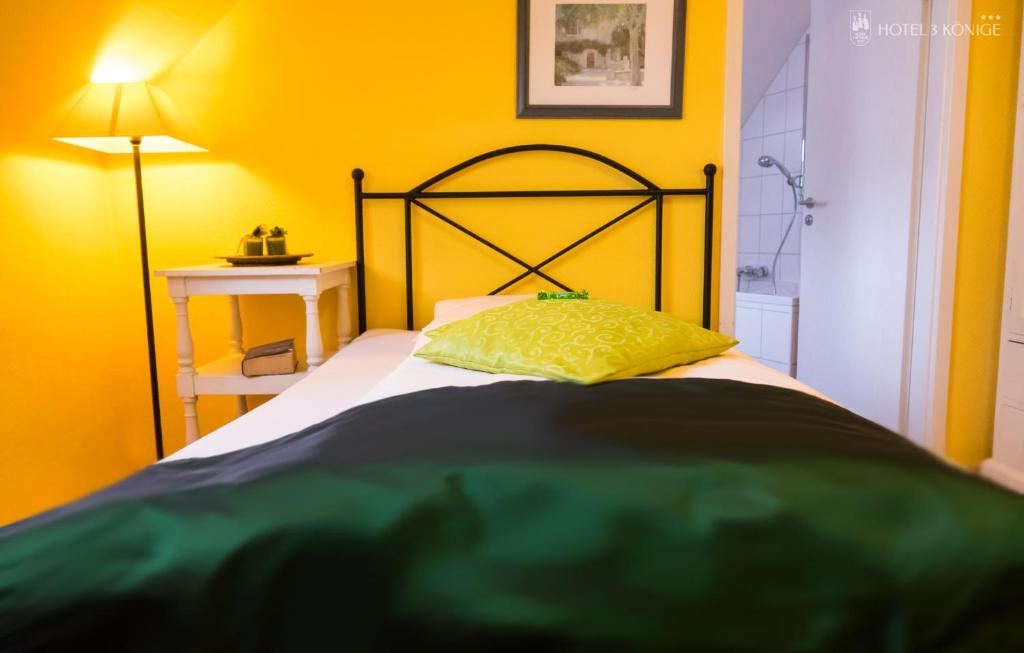 Postel nebo postele na pokoji v ubytování Hotel 3 Könige