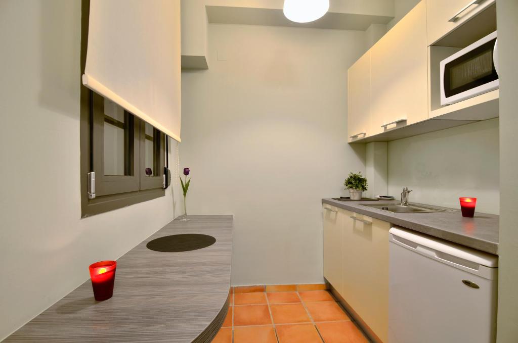 Kuchyň nebo kuchyňský kout v ubytování Ellopia Point Hotel