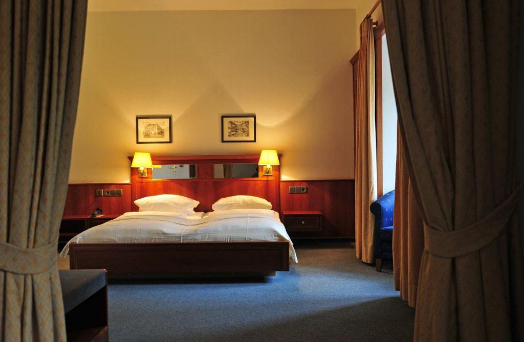 Postel nebo postele na pokoji v ubytování Hotel Haus Reichert