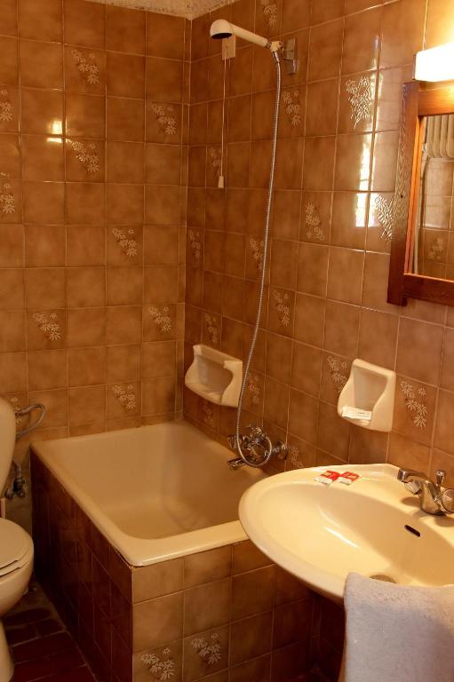 Łazienka w obiekcie Delfini Apartments