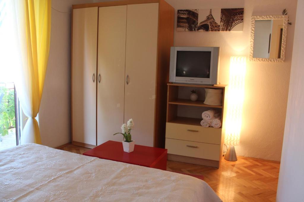 Postel nebo postele na pokoji v ubytování Guesthouse Marta