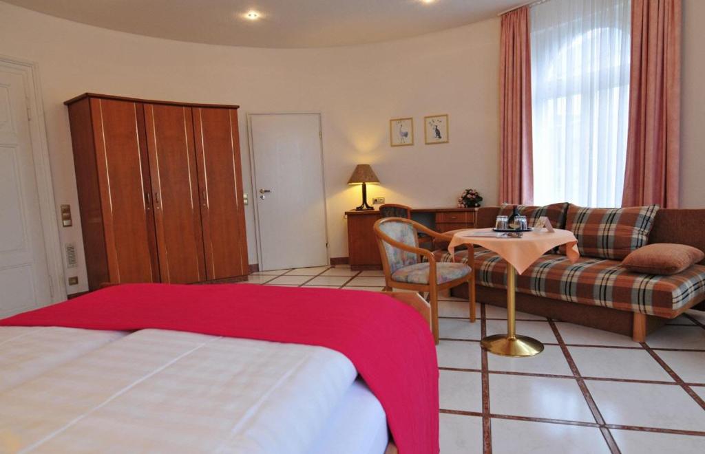 Postel nebo postele na pokoji v ubytování Hotel Haus Reichert