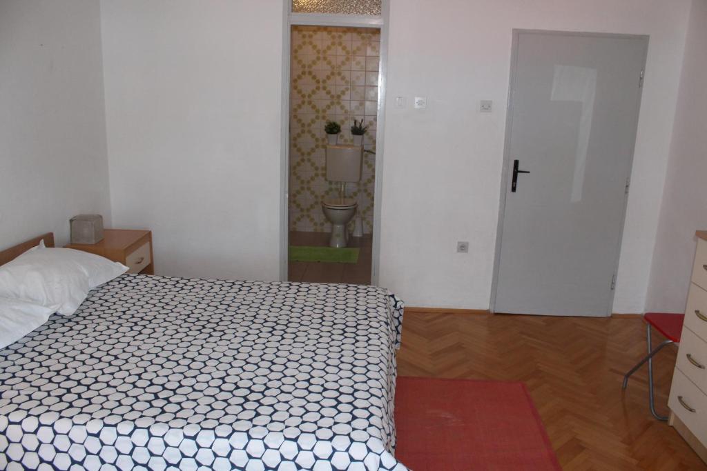 Postel nebo postele na pokoji v ubytování Guesthouse Marta