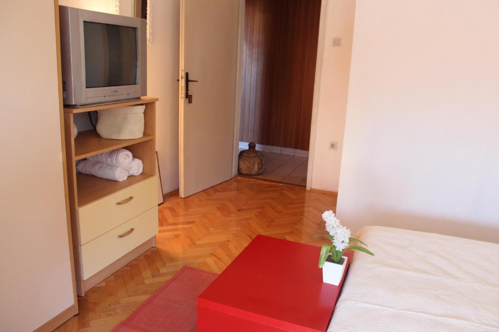 Postel nebo postele na pokoji v ubytování Guesthouse Marta