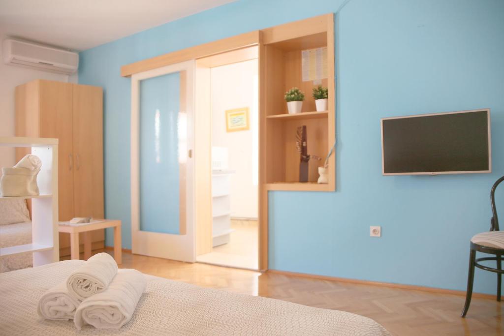 Postel nebo postele na pokoji v ubytování Guesthouse Marta