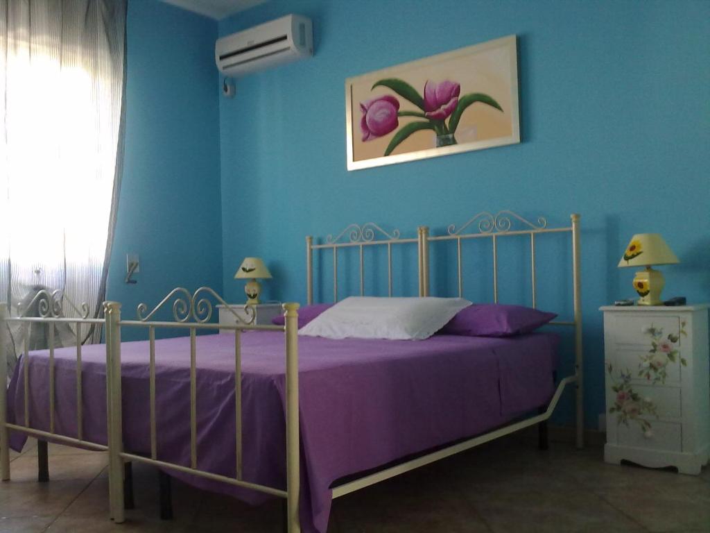 Postel nebo postele na pokoji v ubytování B&B Pittoresco
