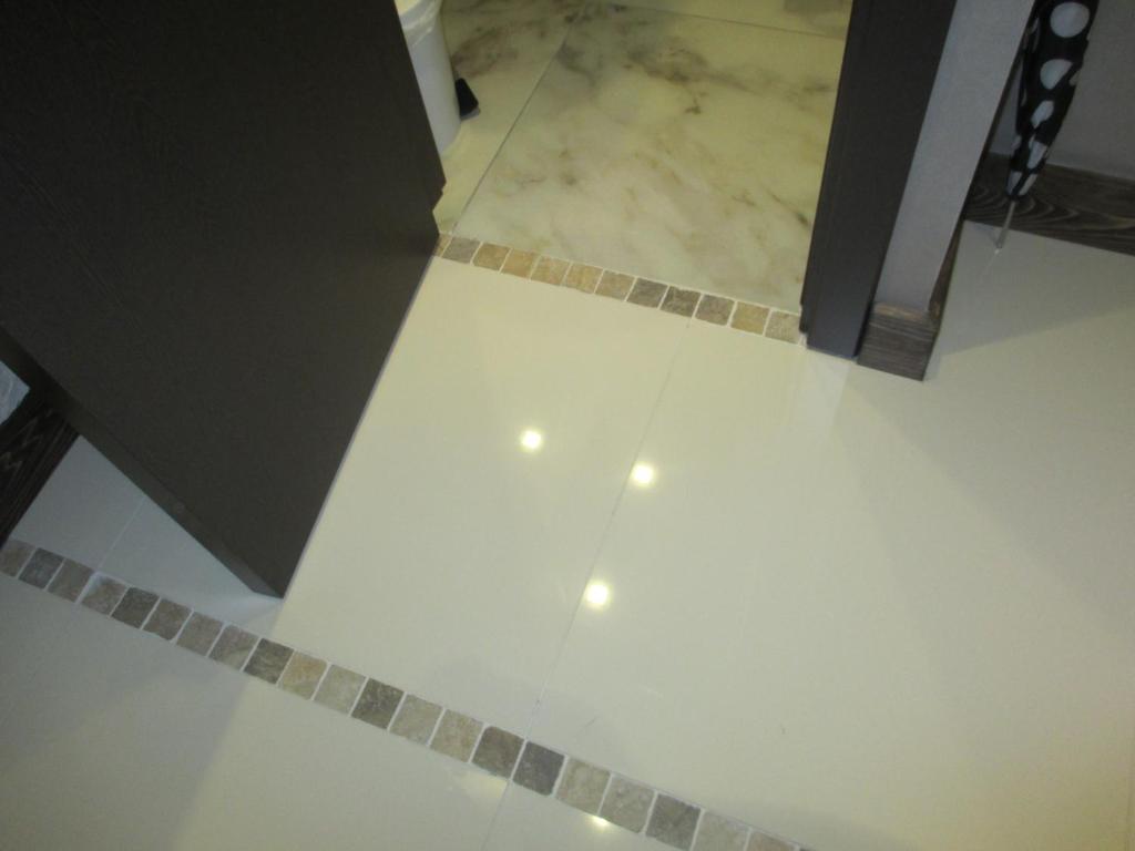 A bathroom at Genex Apartment