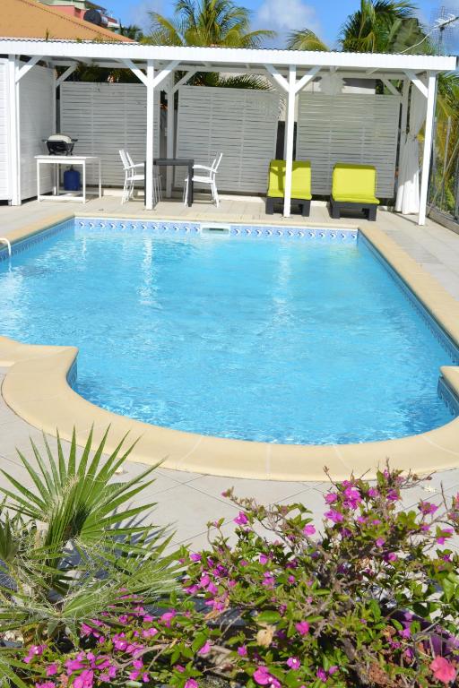 Piscina di Villa Améthyste avec grande piscine privée, jardin clos, parking privé o nelle vicinanze