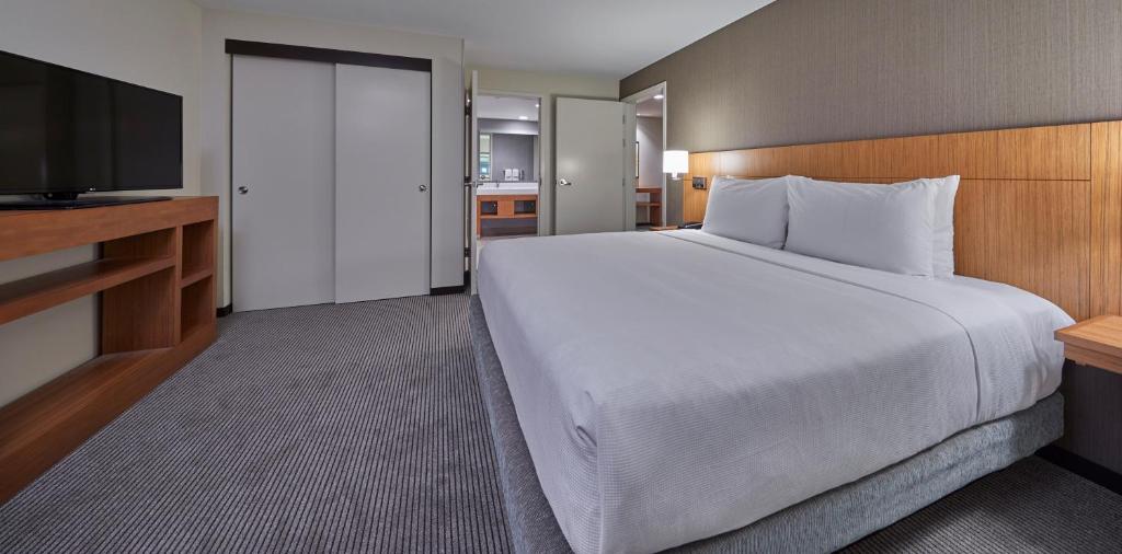 Postel nebo postele na pokoji v ubytování Hyatt Place Eugene/Oakway Center