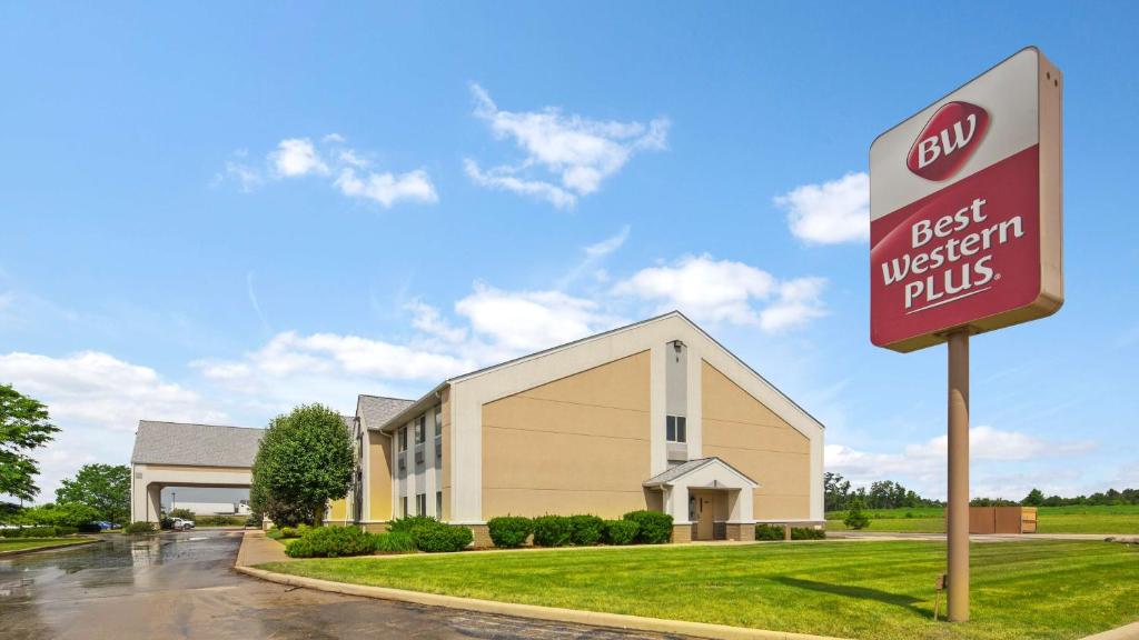 a best western plus sign in front of a building at Best Western Plus Gas City in Gas City