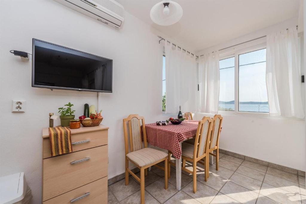 TV a/nebo společenská místnost v ubytování Guest House Ero