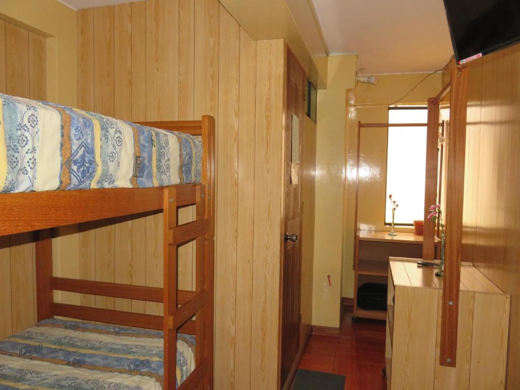 Postel nebo postele na pokoji v ubytování Hospedaje Del Pilar en Magdalena del Mar
