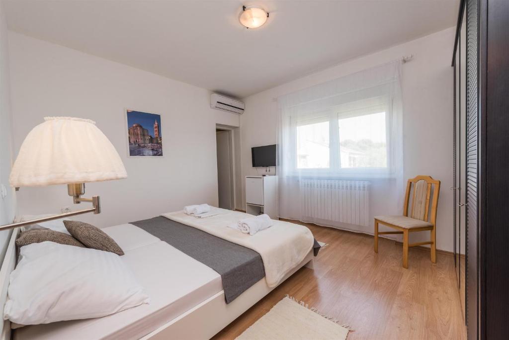 Postel nebo postele na pokoji v ubytování Guest House Ero