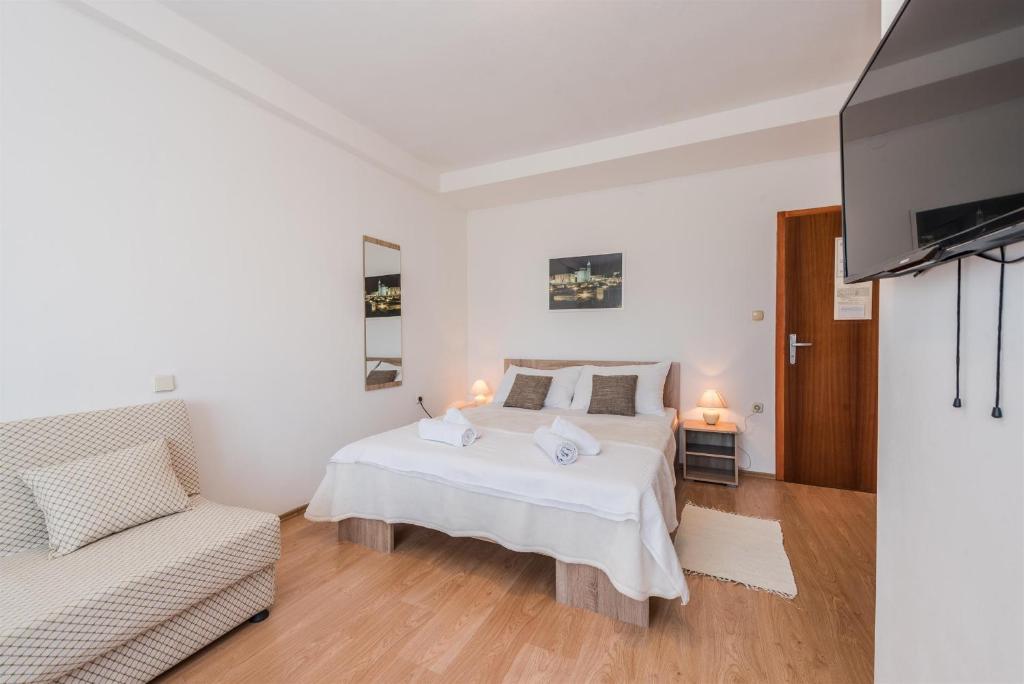 Postel nebo postele na pokoji v ubytování Guest House Ero