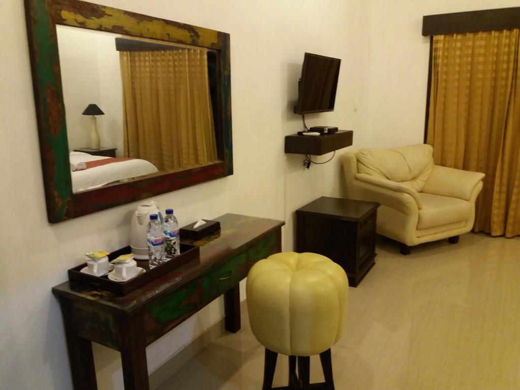 Posezení v ubytování Alam Jogja Resort Mitra RedDoorz