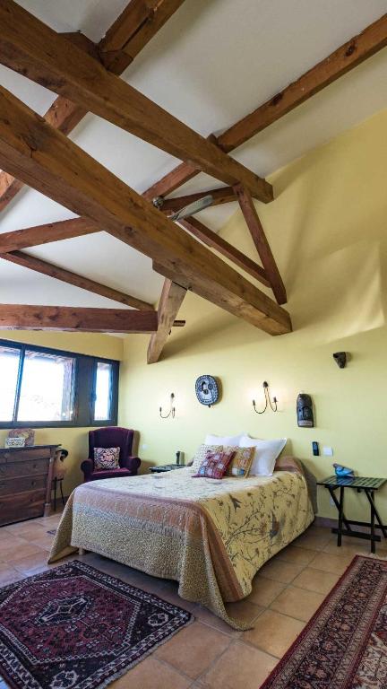 Postel nebo postele na pokoji v ubytování L'Ancienne Auberge
