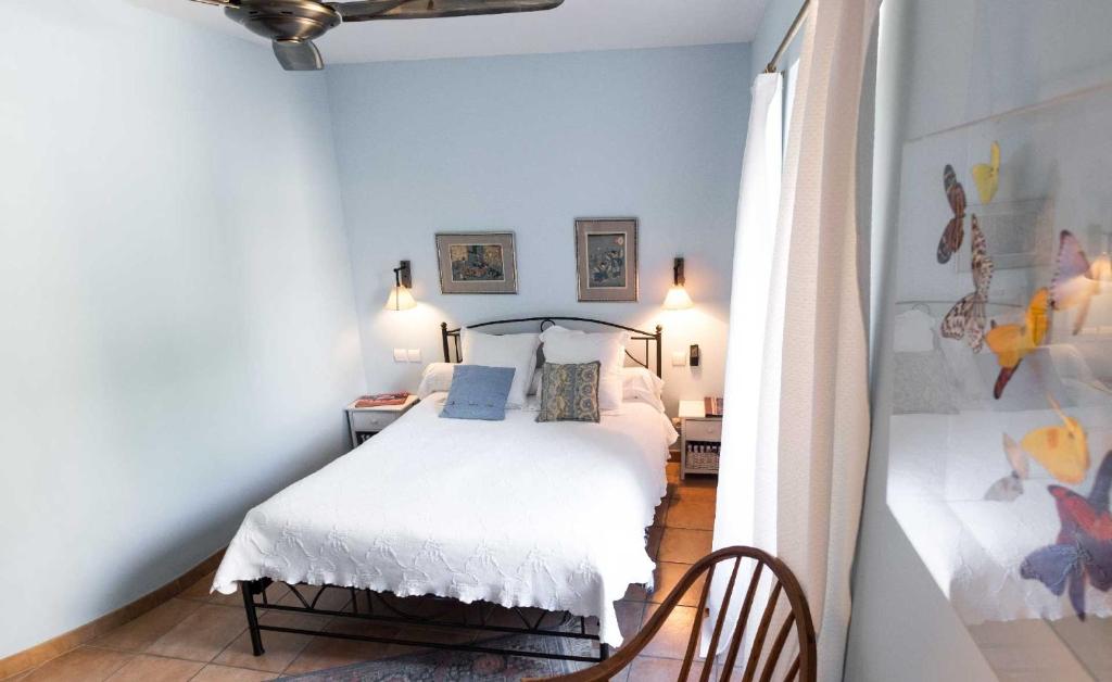 Postel nebo postele na pokoji v ubytování L'Ancienne Auberge