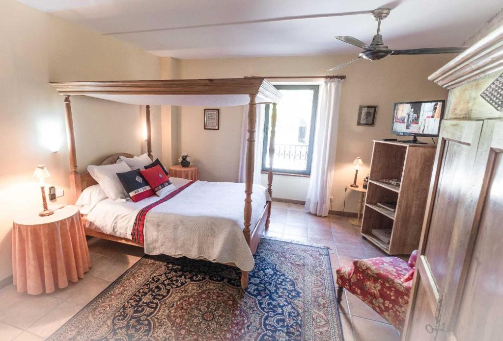 Postel nebo postele na pokoji v ubytování L'Ancienne Auberge