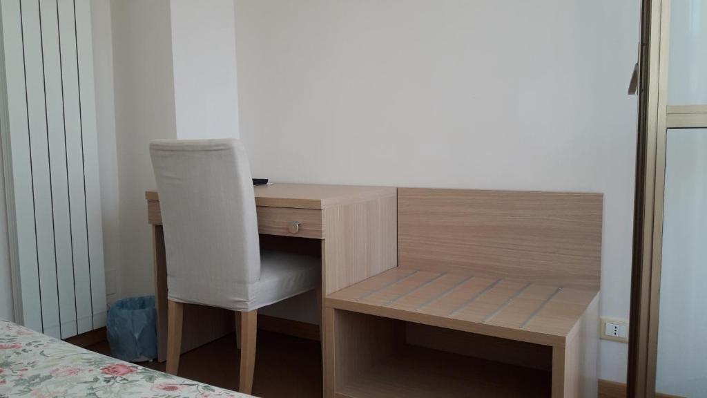 Postel nebo postele na pokoji v ubytování Albergo Nyers