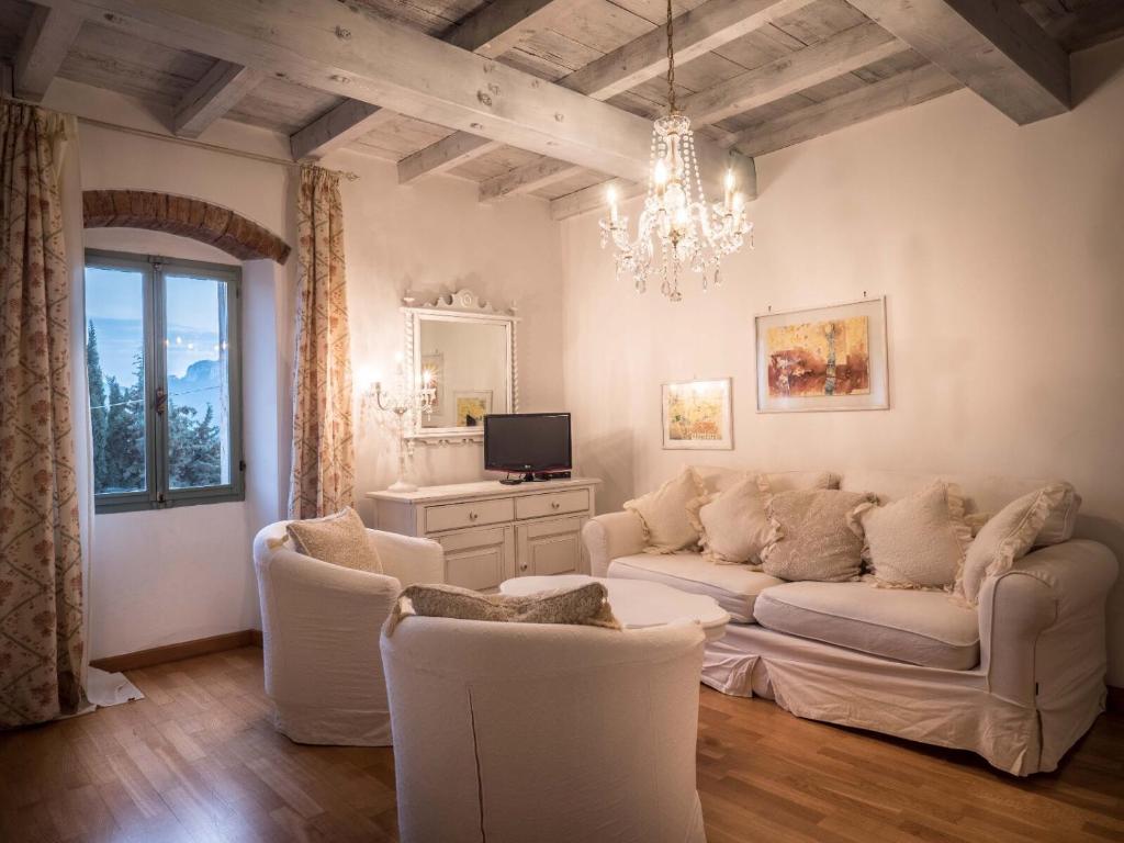 TV a/nebo společenská místnost v ubytování Relais Il Pigno
