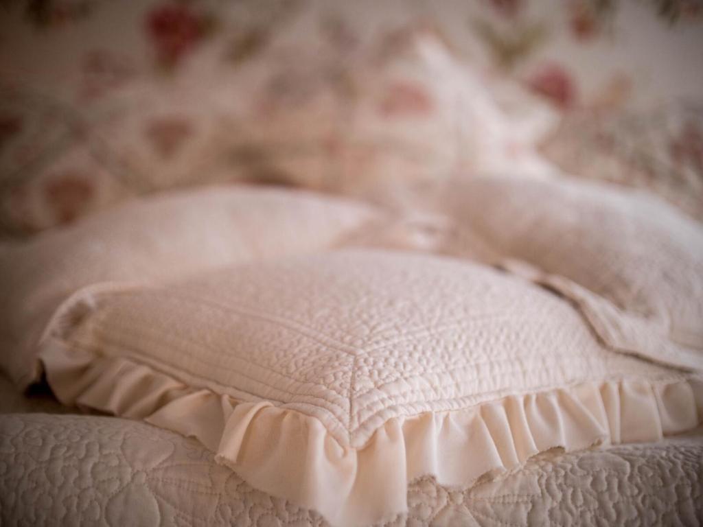 Postel nebo postele na pokoji v ubytování Relais Il Pigno
