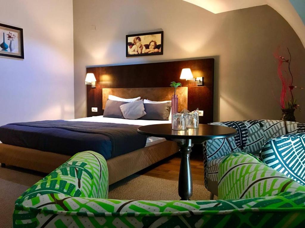 Postel nebo postele na pokoji v ubytování Hotel Dolce International