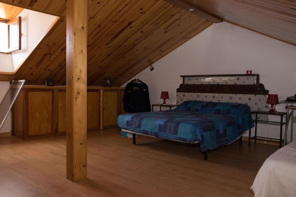 a bedroom with a bed in a attic at Casa en Garachico in Garachico