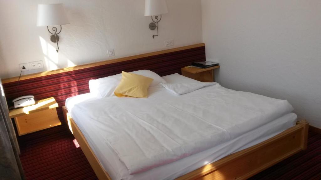 Postel nebo postele na pokoji v ubytování Hotel Bären
