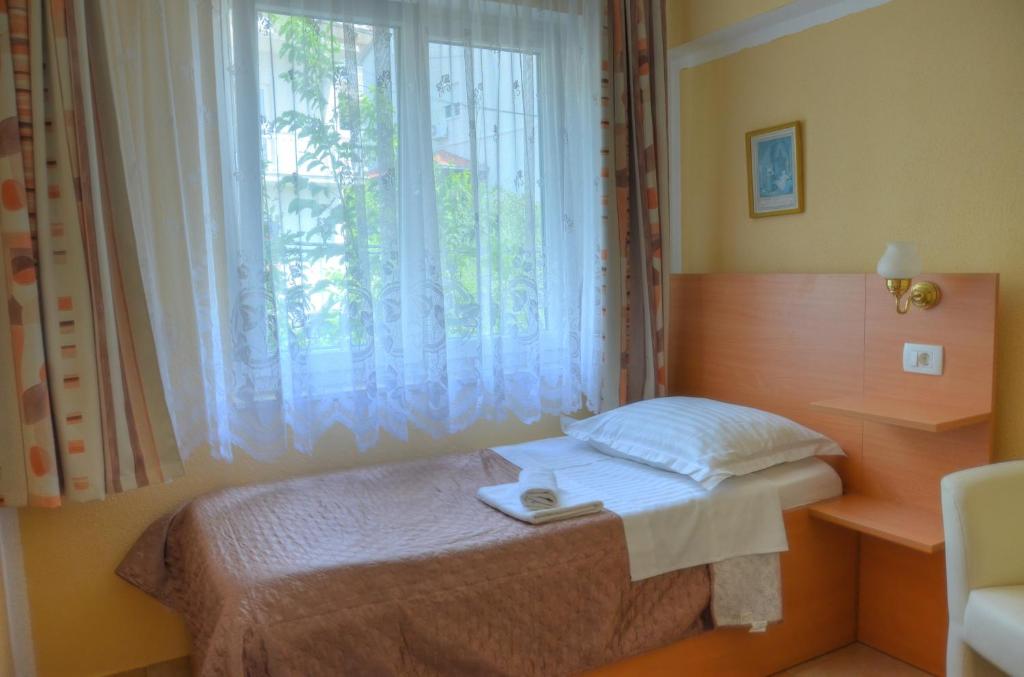 Postel nebo postele na pokoji v ubytování Pansion Begic