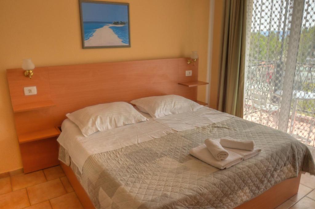 Postel nebo postele na pokoji v ubytování Pansion Begic