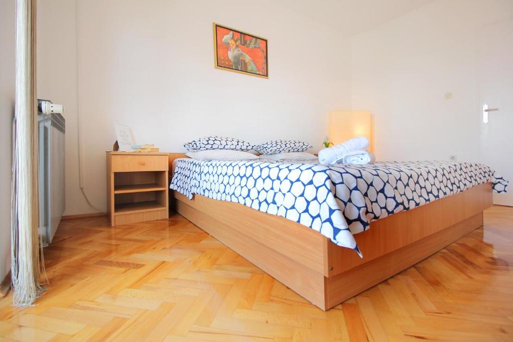 Postel nebo postele na pokoji v ubytování Guesthouse Marta