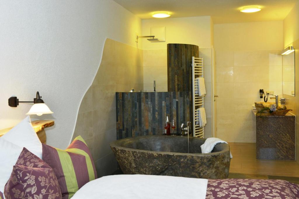 Postel nebo postele na pokoji v ubytování Reit-und Sporthotel Nordmann