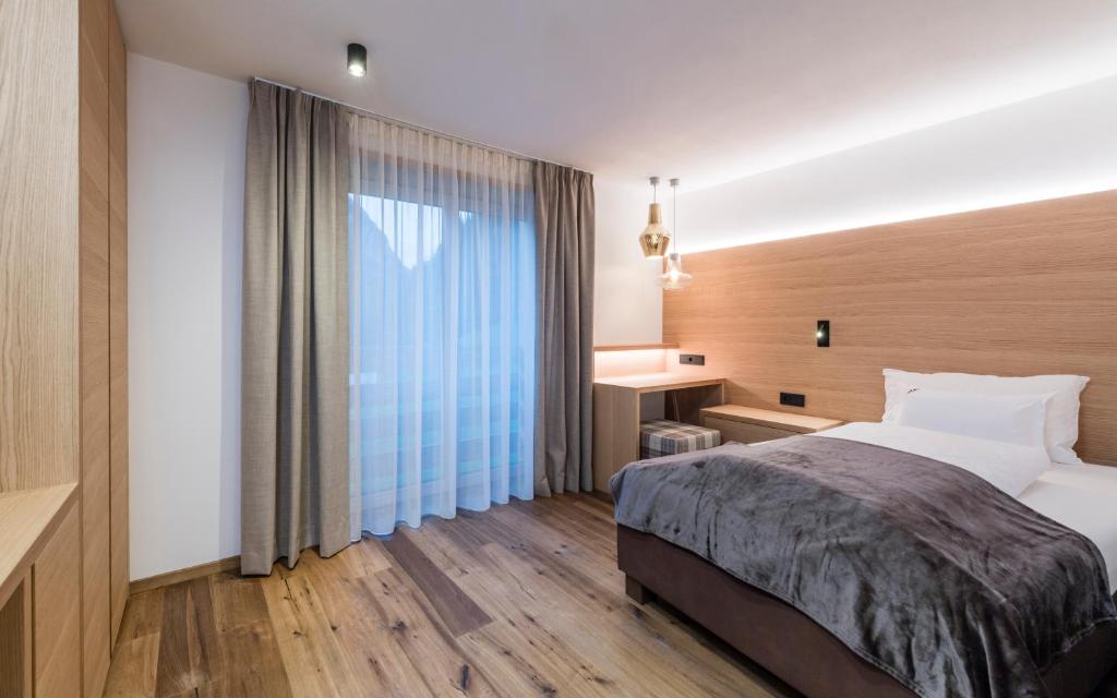 Postel nebo postele na pokoji v ubytování Villa Tony - Small Romantic Hotel
