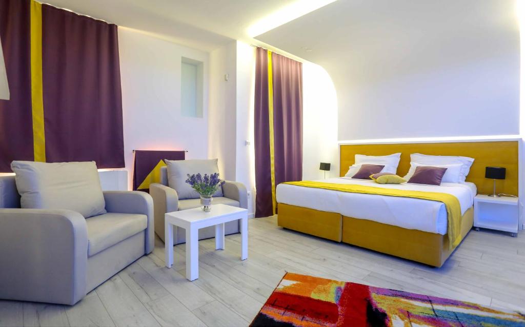 Postel nebo postele na pokoji v ubytování Hotel Boutique Libris
