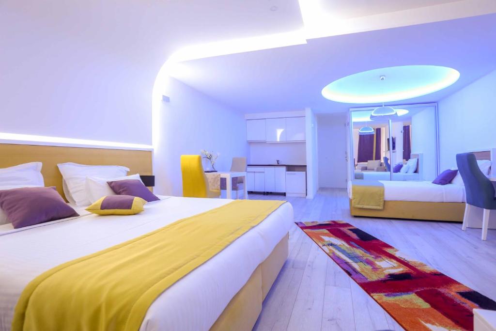 Postel nebo postele na pokoji v ubytování Hotel Boutique Libris