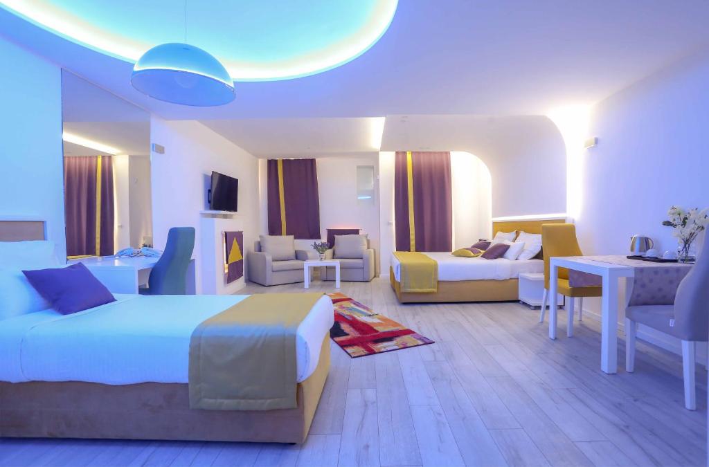 Postel nebo postele na pokoji v ubytování Hotel Boutique Libris