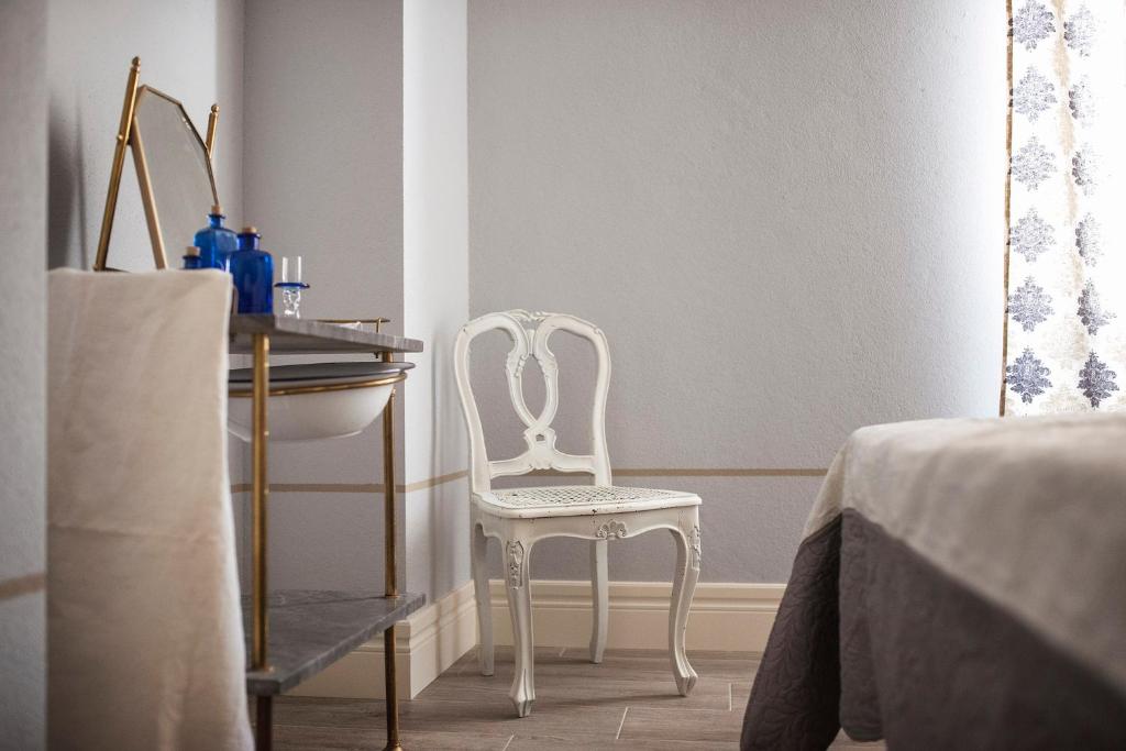 Postel nebo postele na pokoji v ubytování B&B Il Fosso Bianco