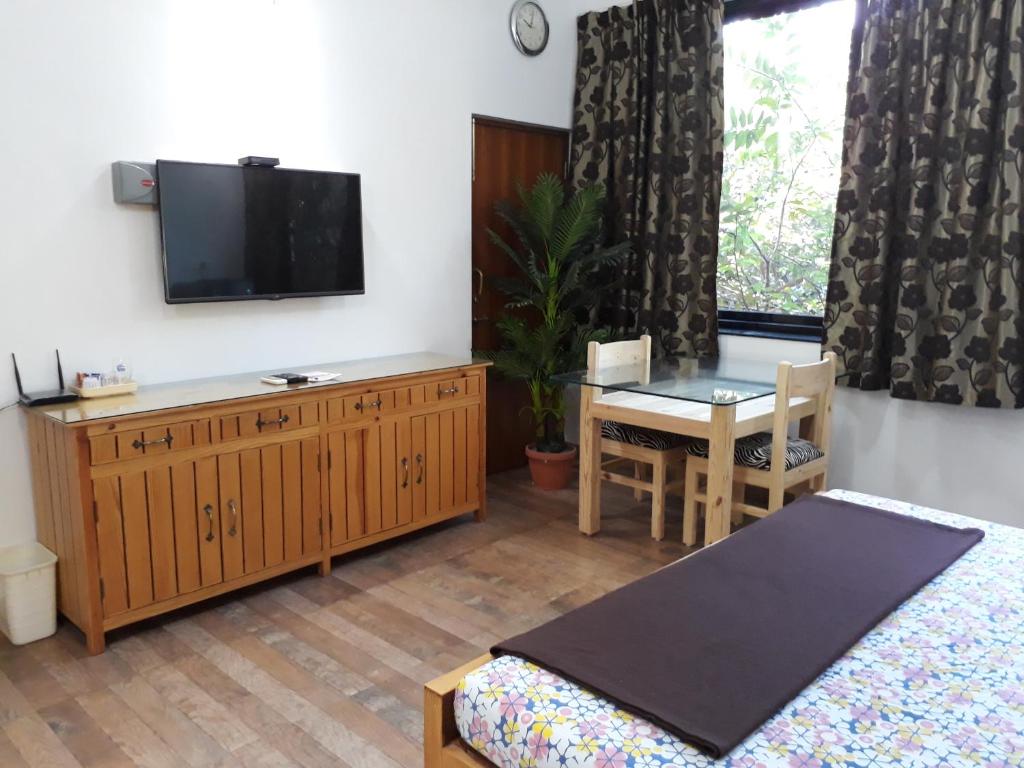 TV a/nebo společenská místnost v ubytování Bis-LIN Home Stay